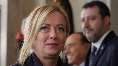 Giorgia Meloni set to be appointed Italy's first female prime minister despite Berlusconi tensions