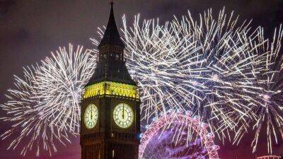 Ticker tape and fireworks bring in the new year in cities around the world