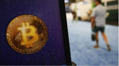 Bitcoin surges above $21,000 amid optimism around inflation, FTX