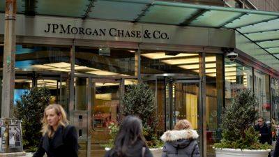 JPMorgan Chase cut about 500 technology and operations jobs this week, sources say
